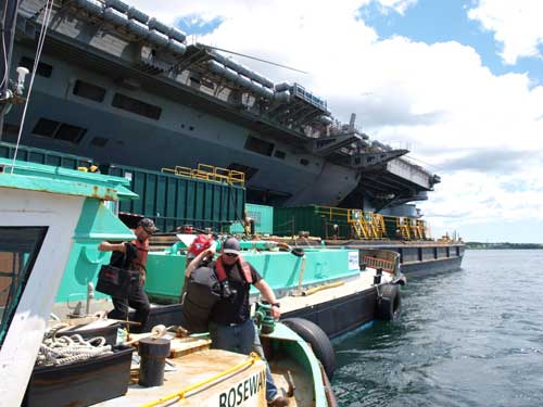DDL delivering marine services to aircraft carrier